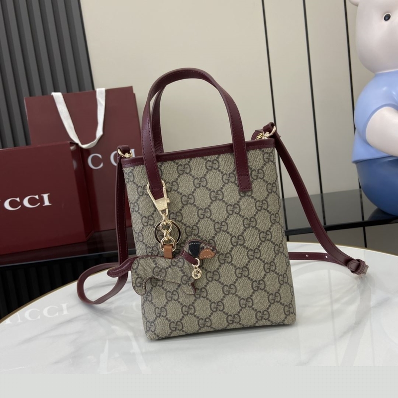 G*u*i top handle bags